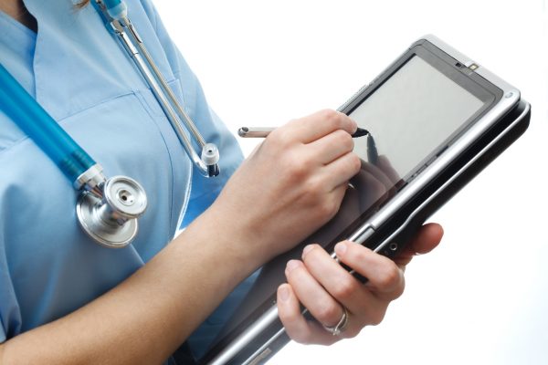 electronic health record Doctor is using tablet pc