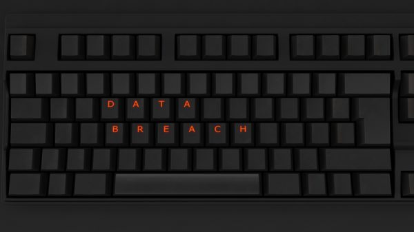 Close Up of Illuminated Glowing Keys on a Black Keyboard Spelling Data Breach 3d illustration