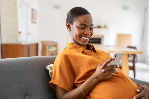 A medical professional using an ultrasound device.