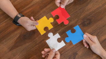 four colorful puzzle pieces