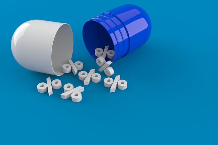 An open drug capsule with percentages showing drug discounts