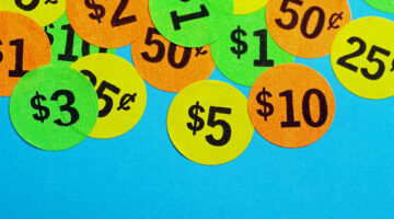 Closeup of many neon colored price stickers
