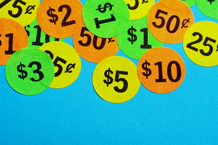 Closeup of many neon colored price stickers