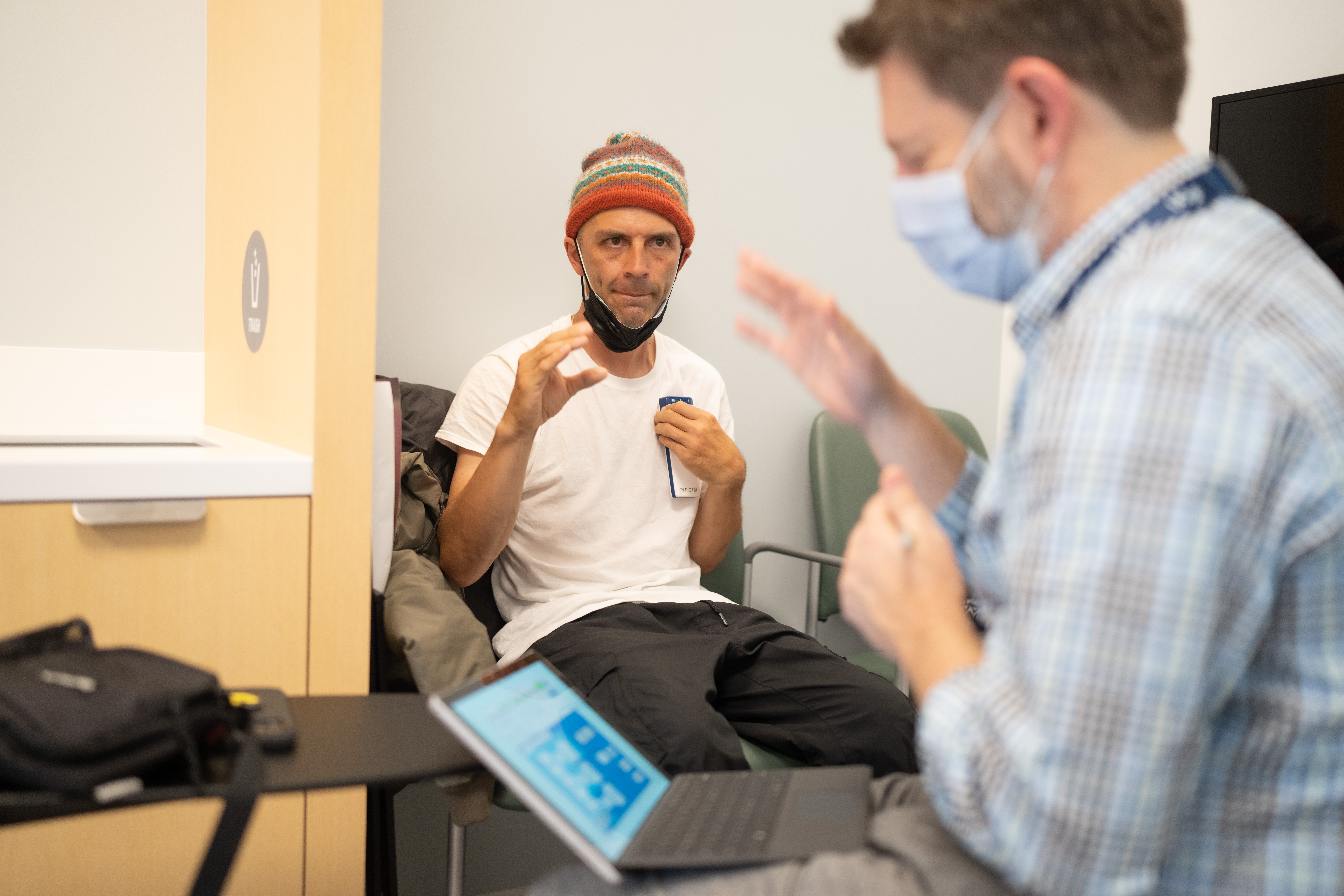 Shawn Connolly follows the directions of Dr. Nicholas B. Galifianakis, MD. while testing the DBS treatment.