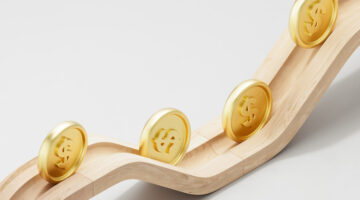 Digitally generated image of rolling coins that follow a set path. The concept of finance, fintech technology, new banking, investment.