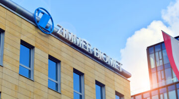 Warsaw, Poland. 20 February 2025. Neon sign with the inscription: Zimmer Biomet.