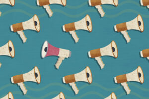 A pattern of megaphones with one megaphone facing in the opposite direction to the rest. A Composite image made of photographic textures and drawn elements