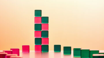 Growing stacks of green and pink blocks