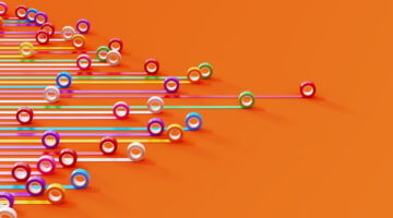 Bar graph made of colorful duct tapes on orange background. Data visualization concept.