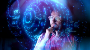 Man look at the dashboard with graphs and charts. Concept of data management system, business intelligence, data statistics, marketing analysis, key performance indicators (KPI) and analytics.