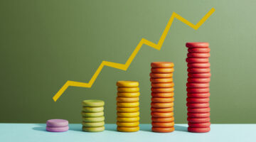 Coins arranged as a bar chart with a graph line above