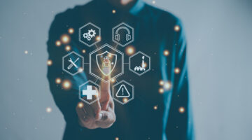 Work Safety Concept - regulations and standard in medical hospital. Doctor offers safety first sign on virtual screen