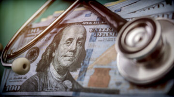 phonendoscope on American tickets, concept of sanitary copayment